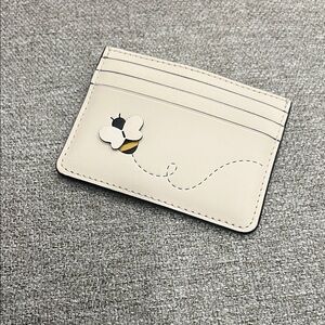 Kate Spade Cream Card Holder with Bee Design